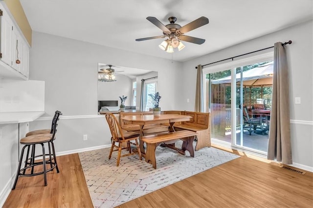 11065 W 98th St, Overland Park, KS 66214 - dining room with light wood-type flooring and a ceiling fan