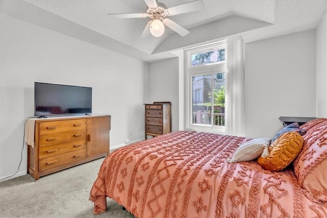 11065 W 98th St, Overland Park, KS 66214 - carpeted bedroom with vaulted ceiling, ceiling fan, and a textured ceiling