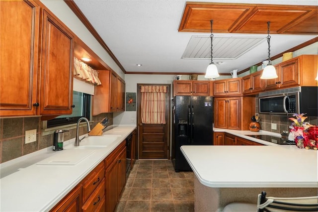 kitchen with black appliances, a sink, backsplash, light countertops, and crown molding