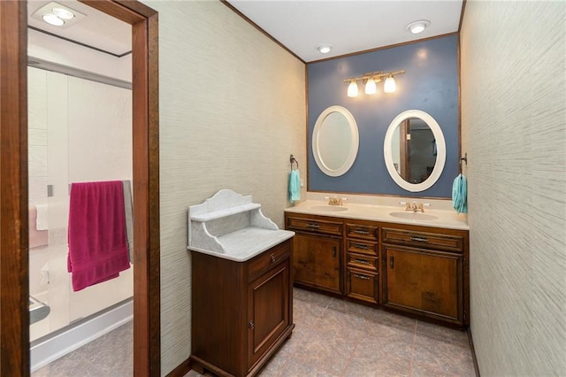 bathroom featuring double vanity, tile patterned flooring, and ornamental molding