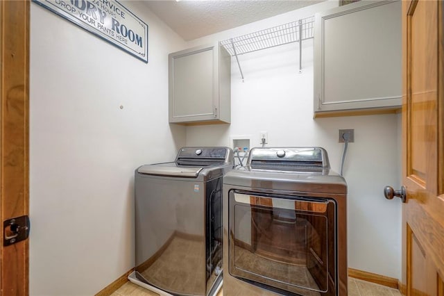 1906 Blackbird Cir, Kearney, MO 64060 - laundry area with cabinet space and separate washer and dryer