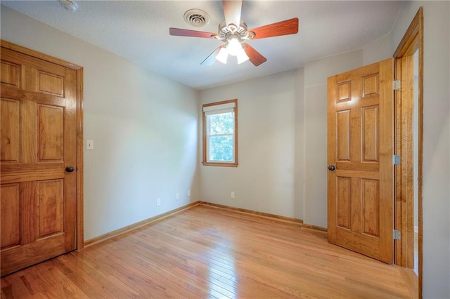 1906 Blackbird Cir, Kearney, MO 64060 - unfurnished bedroom featuring light wood-type flooring and ceiling fan