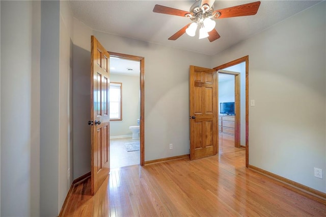1906 Blackbird Cir, Kearney, MO 64060 - unfurnished room featuring light wood-style floors and ceiling fan