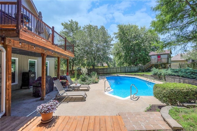 1906 Blackbird Cir, Kearney, MO 64060 - view of pool with a fenced backyard, a patio area, a deck, and stairway