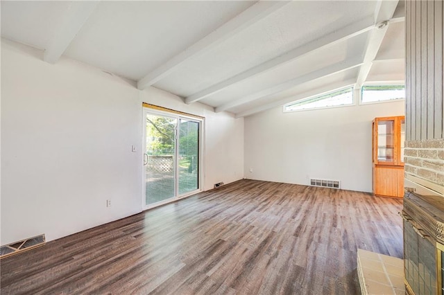 unfurnished living room featuring wood finished floors