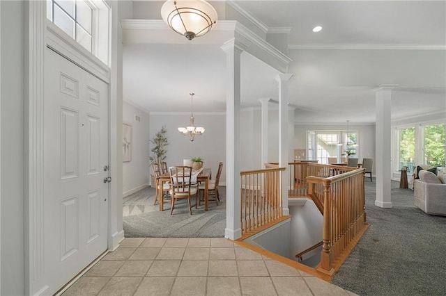 14393 S Cody St, Olathe, KS 66062 - hall with an upstairs landing, carpet floors, ornate columns, crown molding, and baseboards