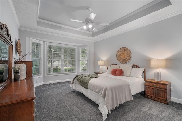 14393 S Cody St, Olathe, KS 66062 - carpeted bedroom featuring a raised ceiling, ornamental molding, baseboards, and a ceiling fan