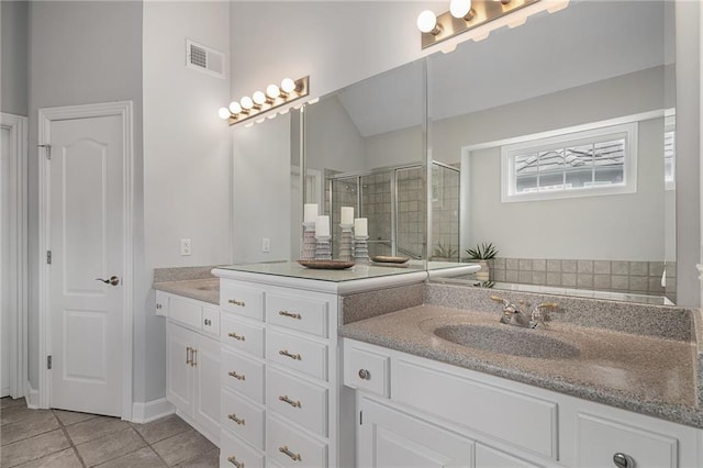 14393 S Cody St, Olathe, KS 66062 - full bathroom with vanity, a shower stall, and tile patterned flooring