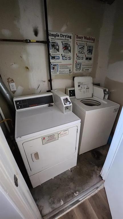 6126 Farrow Ave, Kansas City, KS 66104 - community laundry room featuring separate washer and dryer and wood finished floors