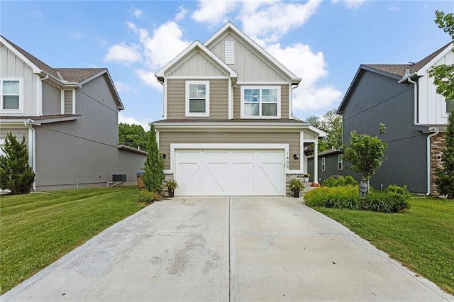 1405 Newport Ln, Raymore, MO 64083 - craftsman-style home featuring board and batten siding, an attached garage, concrete driveway, and a front lawn