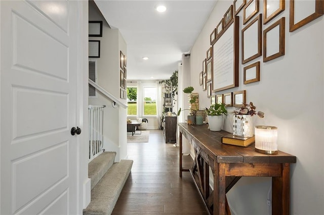 1405 Newport Ln, Raymore, MO 64083 - hallway featuring dark wood-style flooring, recessed lighting, and stairway