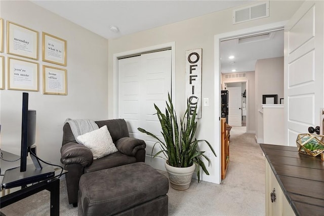 1405 Newport Ln, Raymore, MO 64083 - living area featuring light carpet and baseboards
