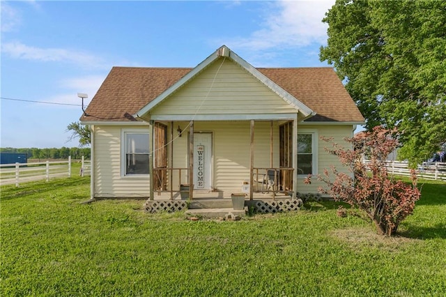 1332 Clark Rd, Williamsburg, KS 66095 - bungalow featuring a porch and a shingled roof