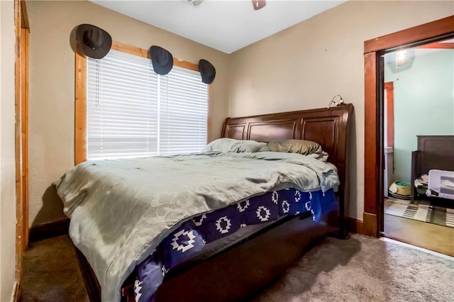 1332 Clark Rd, Williamsburg, KS 66095 - carpeted bedroom with baseboards and ceiling fan