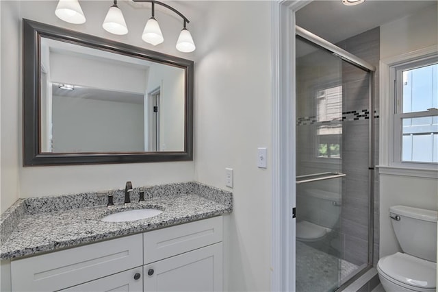3512 Apple Tree Ln, Gladstone, MO 64119 - bathroom with toilet, vanity, and a shower stall