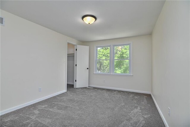 3512 Apple Tree Ln, Gladstone, MO 64119 - unfurnished room featuring carpet flooring and baseboards