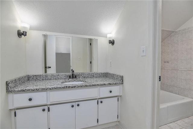 3512 Apple Tree Ln, Gladstone, MO 64119 - full bathroom featuring vanity, shower / washtub combination, and a textured ceiling