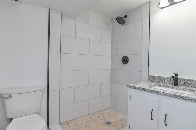 3512 Apple Tree Ln, Gladstone, MO 64119 - bathroom with toilet, a tile shower, and vanity