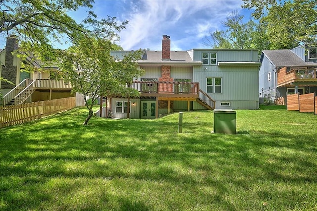 3512 Apple Tree Ln, Gladstone, MO 64119 - rear view of house featuring stairs, a wooden deck, french doors, and a yard
