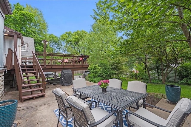 6843 Locust St, Kansas City, MO 64131 - view of patio / terrace with outdoor dining space and a deck
