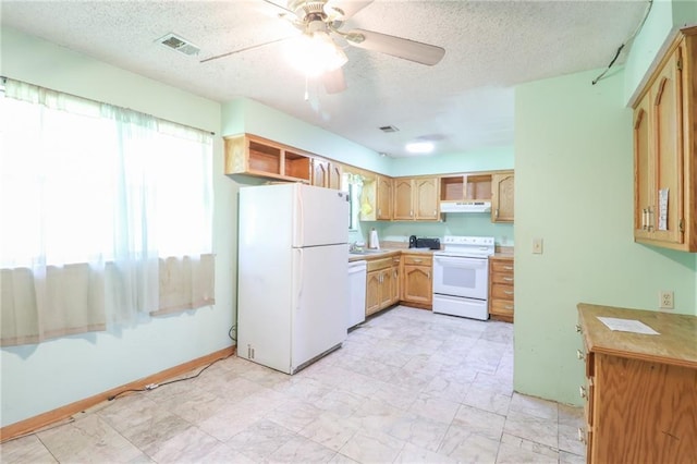 1175 SW State Route 58th Hwy, Holden, MO 64040 - kitchen featuring white appliances, under cabinet range hood, healthy amount of natural light, open shelves, and a textured ceiling