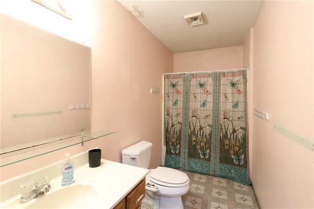 1175 SW State Route 58th Hwy, Holden, MO 64040 - full bath featuring tile patterned floors, vanity, toilet, and a shower with shower curtain
