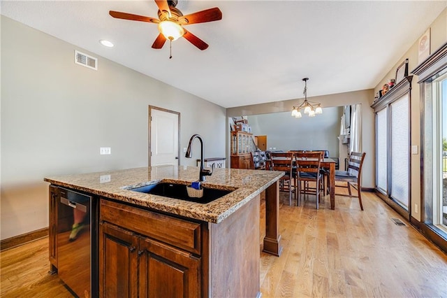 4000 S Buckner Tarsney Rd, Grain Valley, MO 64029 - kitchen with a sink, stainless steel dishwasher, light wood finished floors, baseboards, and recessed lighting