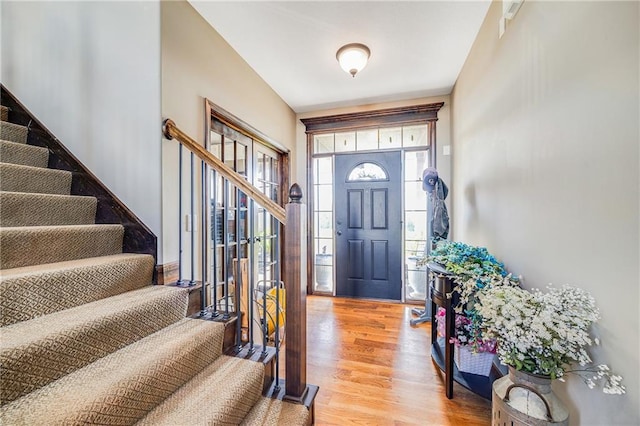 4000 S Buckner Tarsney Rd, Grain Valley, MO 64029 - entrance foyer with stairs and light wood-type flooring