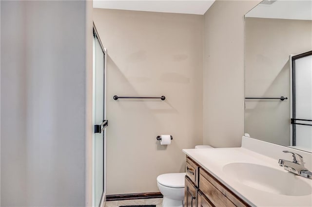 4000 S Buckner Tarsney Rd, Grain Valley, MO 64029 - bathroom featuring toilet, vanity, a shower stall, and baseboards