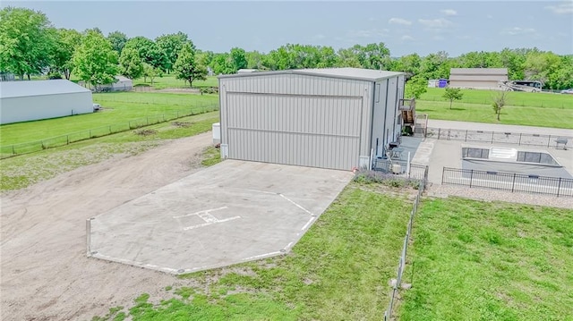 4000 S Buckner Tarsney Rd, Grain Valley, MO 64029 - detached garage featuring driveway