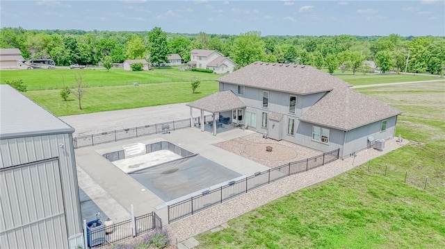 4000 S Buckner Tarsney Rd, Grain Valley, MO 64029 - rear view of property with a patio, a shingled roof, and cooling unit