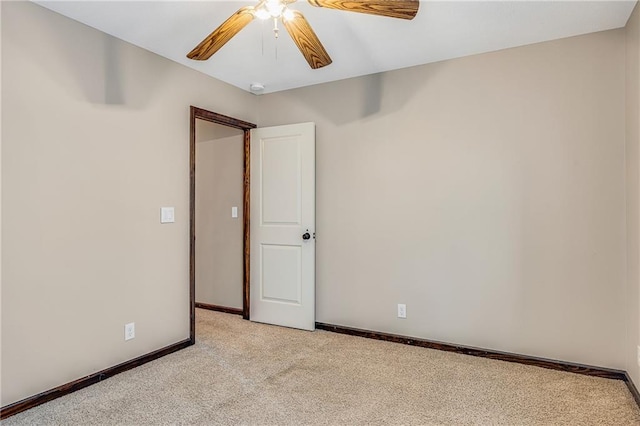 4000 S Buckner Tarsney Rd, Grain Valley, MO 64029 - spare room with ceiling fan, light colored carpet, and a smoke detector