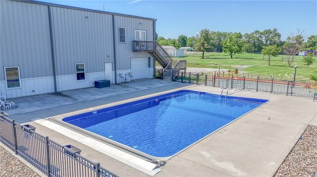4000 S Buckner Tarsney Rd, Grain Valley, MO 64029 - view of pool featuring stairs and a patio area