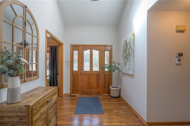 1407 SW Meyer Blvd, Blue Springs, MO 64015 - foyer featuring wood finished floors and baseboards