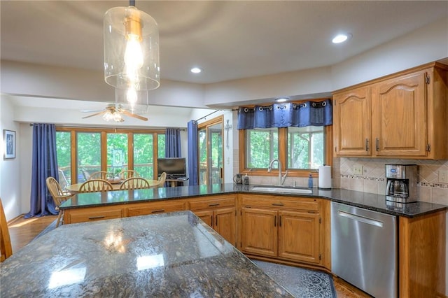 1407 SW Meyer Blvd, Blue Springs, MO 64015 - kitchen featuring stainless steel dishwasher, a sink, ceiling fan, plenty of natural light, and recessed lighting
