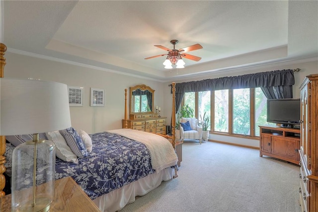 1407 SW Meyer Blvd, Blue Springs, MO 64015 - bedroom featuring a tray ceiling, light colored carpet, ornamental molding, and a ceiling fan