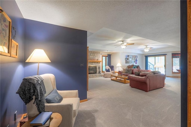 1407 SW Meyer Blvd, Blue Springs, MO 64015 - carpeted living room featuring a textured ceiling, ceiling fan, and a fireplace
