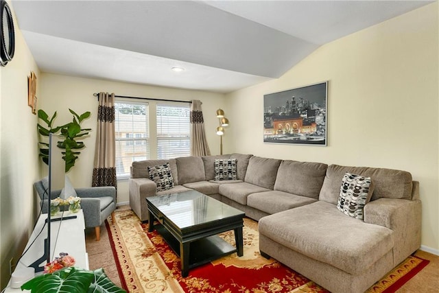 1201 N Mart-Way Dr Unit 109, Olathe, KS 66061 - living room featuring carpet flooring, vaulted ceiling, and baseboards