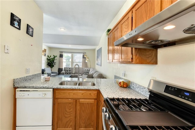 1201 N Mart-Way Dr Unit 109, Olathe, KS 66061 - kitchen featuring white dishwasher, stainless steel range with gas stovetop, under cabinet range hood, a sink, and brown cabinets