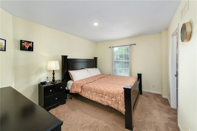 1201 N Mart-Way Dr Unit 109, Olathe, KS 66061 - bedroom featuring light colored carpet and baseboards