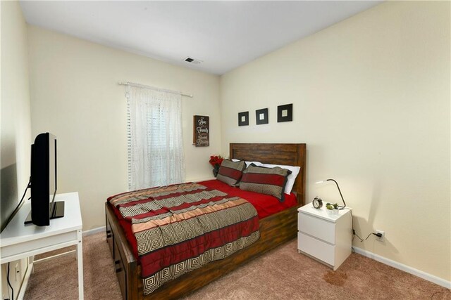 1201 N Mart-Way Dr Unit 109, Olathe, KS 66061 - bedroom featuring carpet flooring and baseboards