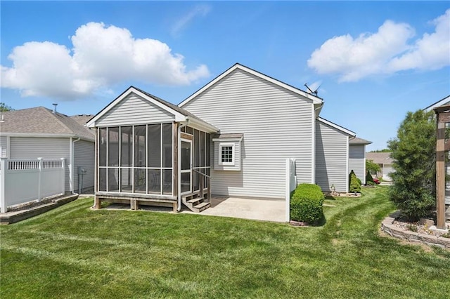 1605 NW Primrose Ln, Blue Springs, MO 64015 - back of house featuring a sunroom and a patio
