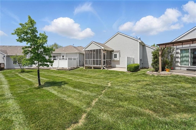 1605 NW Primrose Ln, Blue Springs, MO 64015 - back of property featuring a sunroom
