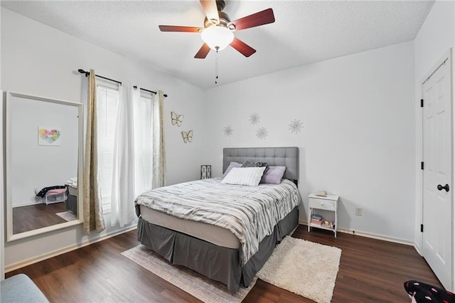 1605 NW Primrose Ln, Blue Springs, MO 64015 - bedroom featuring dark wood finished floors and a ceiling fan