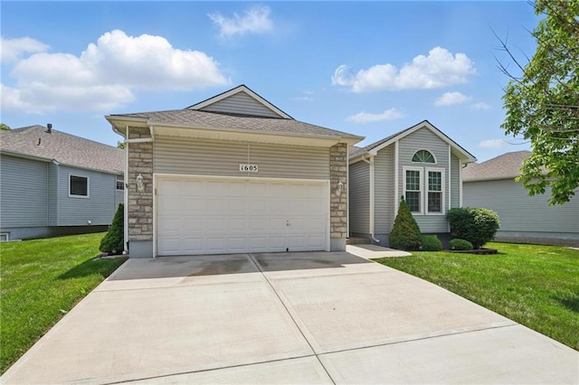 1605 NW Primrose Ln, Blue Springs, MO 64015 - single story home featuring stone siding, driveway, and a front lawn