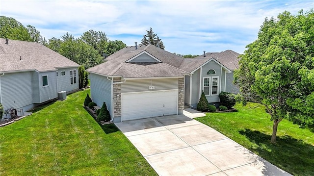1605 NW Primrose Ln, Blue Springs, MO 64015 - view of front of home with concrete driveway, a front lawn, and a garage