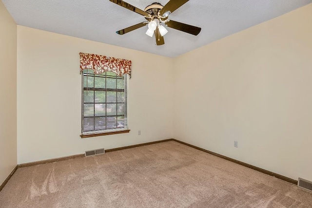5004 S Kendall Dr, Independence, MO 64055 - empty room featuring carpet flooring and a ceiling fan