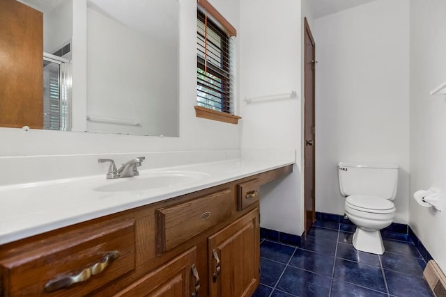 5004 S Kendall Dr, Independence, MO 64055 - bathroom with vanity, tile patterned floors, and a shower stall
