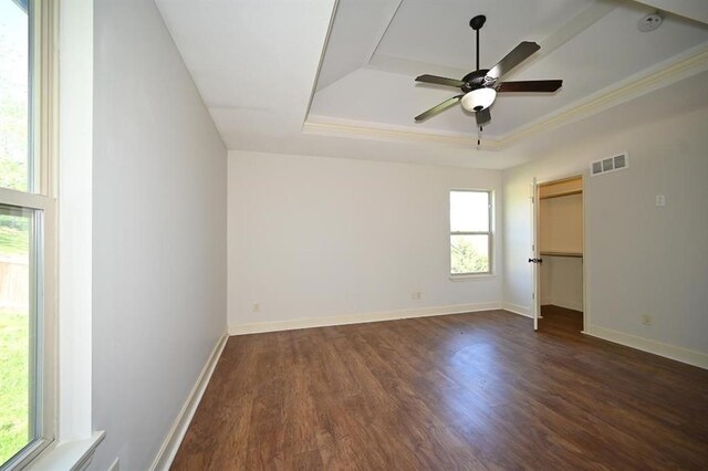 15790 NW 125th St, Platte City, MO 64079 - empty room featuring a tray ceiling, wood finished floors, ceiling fan, crown molding, and baseboards