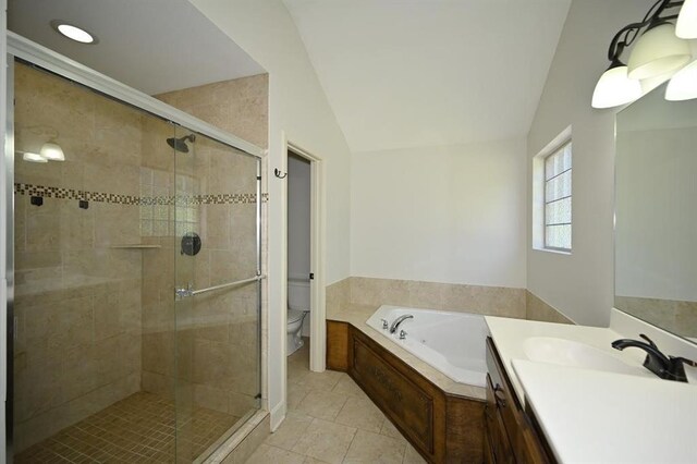 15790 NW 125th St, Platte City, MO 64079 - full bathroom with lofted ceiling, a stall shower, toilet, tile patterned flooring, and a bath